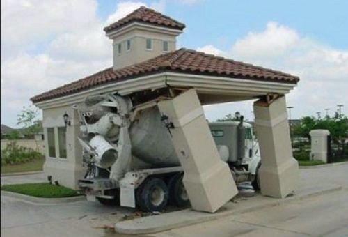 Funny photo cement truck hits roof on drive through