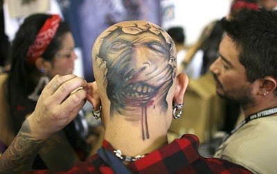 Tattoo on back of head zombie coming out of head