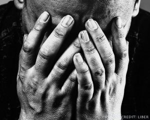 Man hands in face crying symbol children shot in CT