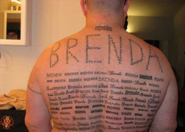 brenda tattooed on mans back in hundreds of different ways and fonts