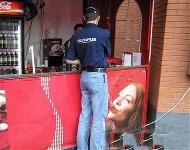 drinking coke from a bottle counter