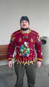 Ugly Christmas sweater with dangling ornaments.